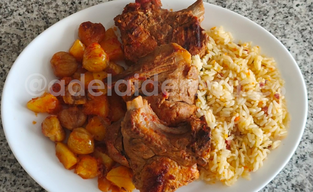 Lombo de porco no forno com castanhas, batatas acompanhado com arroz de presunto